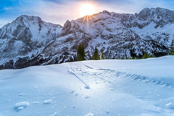 istock Ice crust over snowy mountains and pastures 590075412