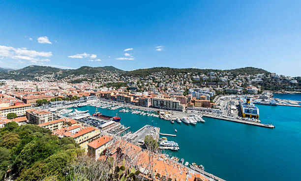 The main port with boats in Nice, France. Logos removed.