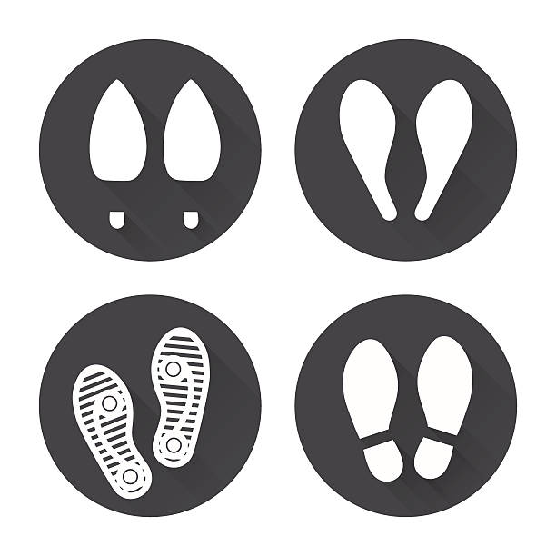 Flat footprint icons set Flat footprint icons set with shadows vector animal toe stock illustrations