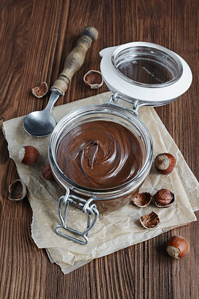 istock Chocolate hazelnut spread in a glass jar 590135506