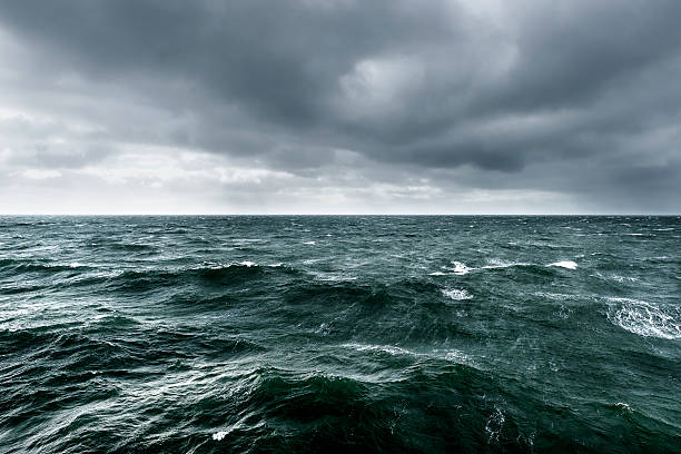 Intense winter storm brewing over ocean stock photo