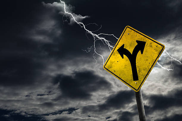 istock Folk in Road Sign With Stormy Background 590138836