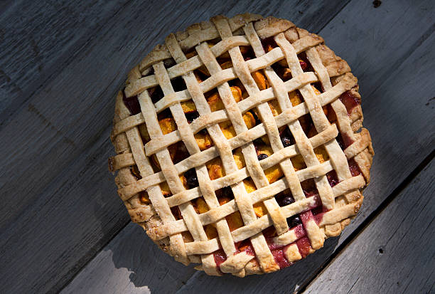 istock Peach and Blueberry Lattice Pie 590139086
