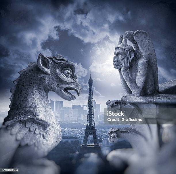 Gargoyle Figur On Notre Dame With Eiffel Tower At Night Stock Photo - Download Image Now