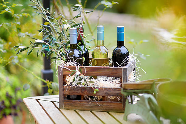 Wine bottles in a wooden crate stock photo