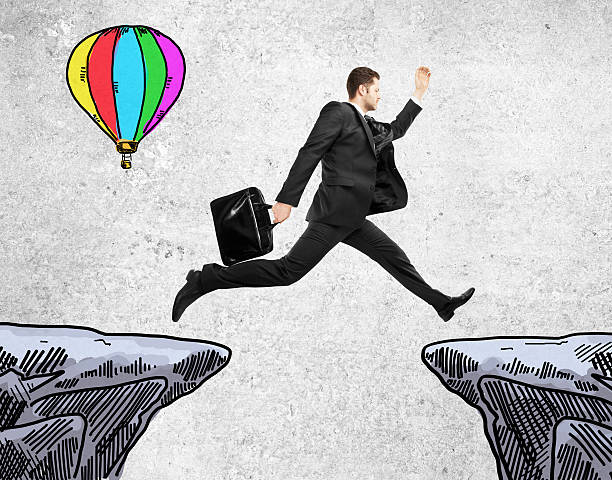 istock Success concept with jumping businessman 590141762