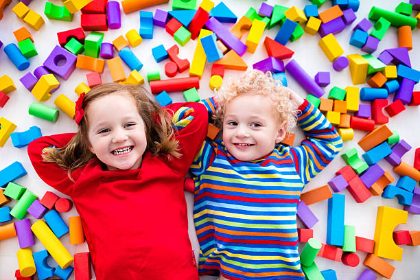 istock Children playing with colorful blocks. 590142276