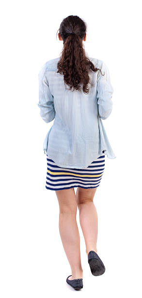 istock back view of running  woman. 590142432