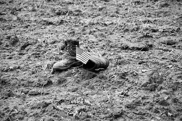 istock American Farmer's Old Leather Work Boots with Flag 590143018