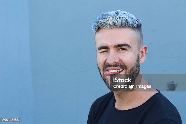 Peculiar Guy Making A Funny Face Stock Photo - Download Image Now - Dyed  Hair, Men, Boys - iStock