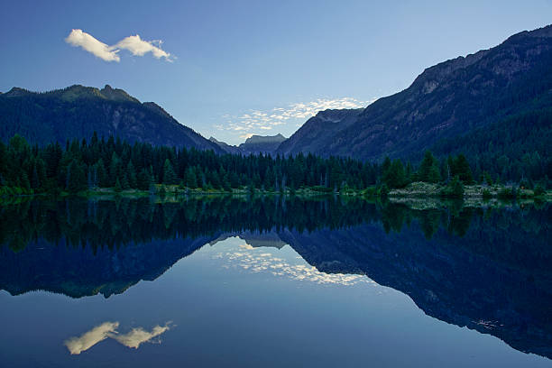 istock Morning Lake Reflection in Washington Cascades 590144734