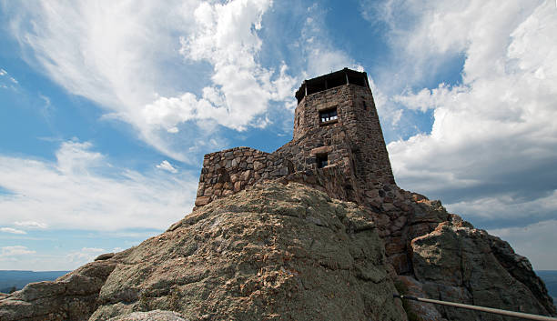istock Harney Peak Fire Lookout Tower under cirrus skies 590144998