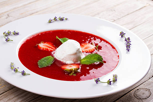 istock Strawberry soup with ice cream and mint 590145480