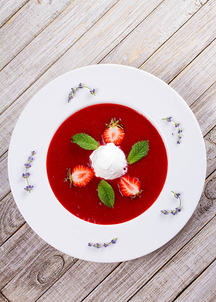 istock Strawberry soup with ice cream and mint 590145544