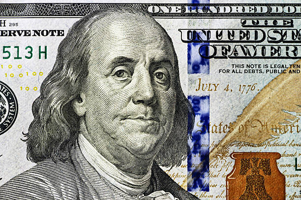 istock portrait of Benjamin Franklin 100 dollars close-up 590145546