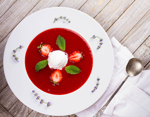 istock Strawberry soup with ice cream and mint 590145560