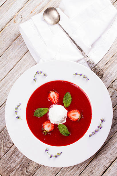 istock Strawberry soup with ice cream and mint 590145580