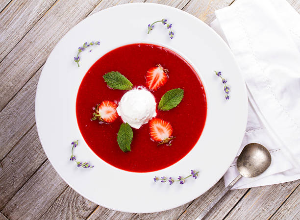 istock Strawberry soup with ice cream and mint 590145596