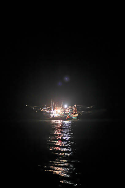 istock Squid fishing boat 590147446