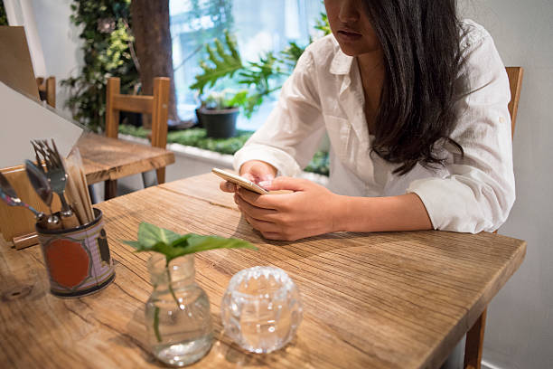 istock Young woman in cafe. 590147816