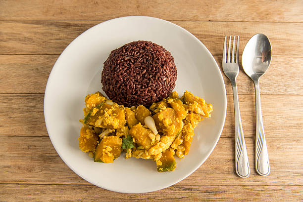 istock Stir Fried Pumpkin with Egg and berry rice , 590149718