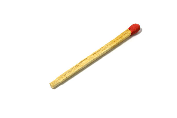 red match stick with box isolated on a white background Close up of a red match stick isolated on a white background with clipping path unlit match stock pictures, royalty-free photos & images