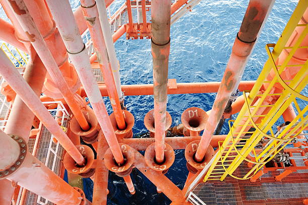 istock Oil and Gas Producing Slots at Offshore Platform. 590150072