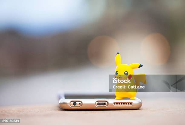 Nintendo Pokemon Go Character Pikachu And Iphone Stock Photo - Download  Image Now - Pokémon, Augmented Reality, Manga Style - iStock