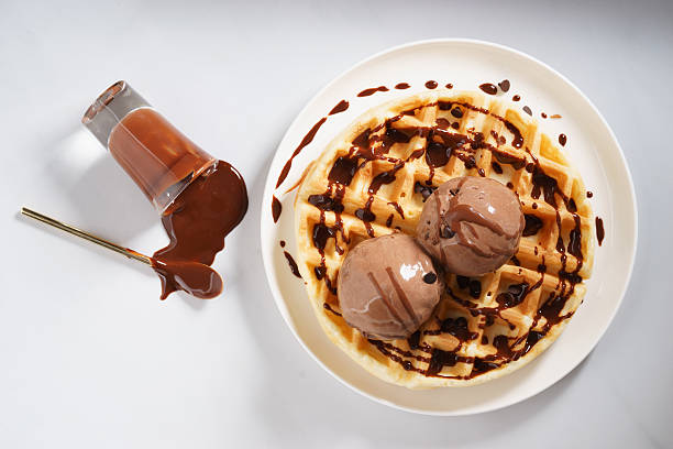 waffles with chocolate ice cream and chocolate sauce