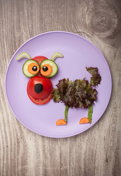 istock Funny dog made of vegetables 590154650