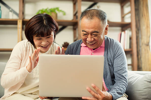 istock Elderly couple using a laptop together. 590155626