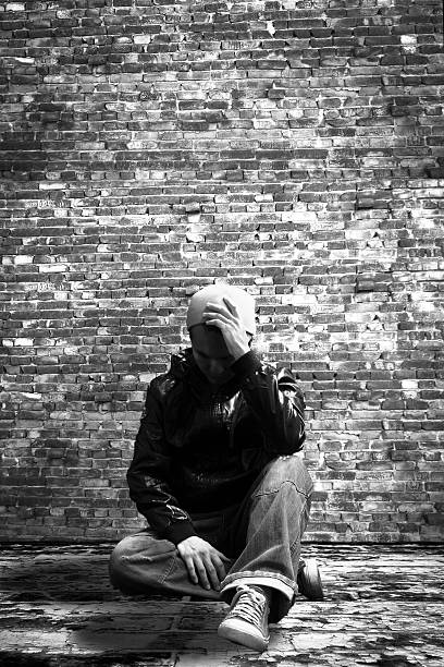 istock unhappy & worried asian man thinking about his problem 590156082