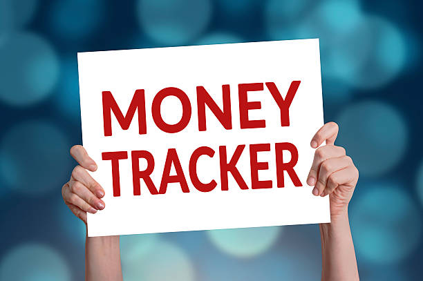 istock Money tracker card with blue bokeh lights background 590156426