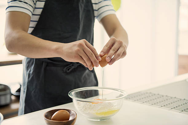 istock Japanese young man cooking on holiday 590156810