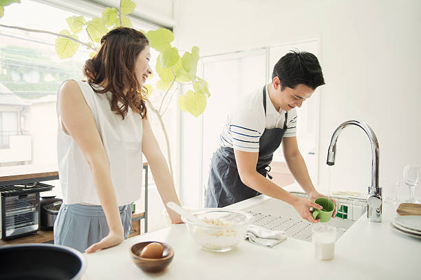 istock Japanese young couple cooking on holiday 590156878