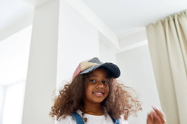 istock Funny girl in cap 590160106