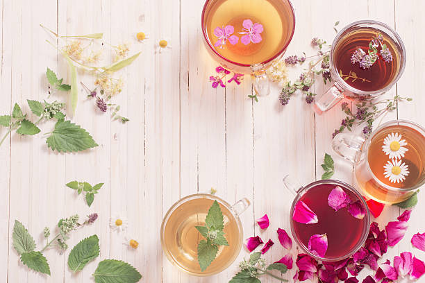 istock herbal tea on a white wooden background 590160734