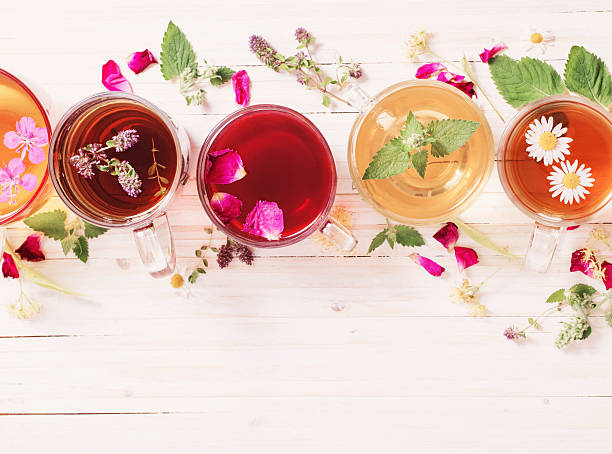istock herbal tea on a white wooden background 590160880