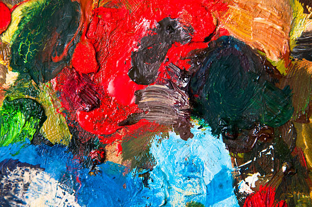 istock Oil paints multicolored closeup abstract background 590161318