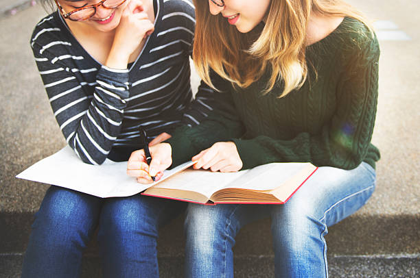 istock Women Talking Friendship Studying Brainstorming Concept 590162928