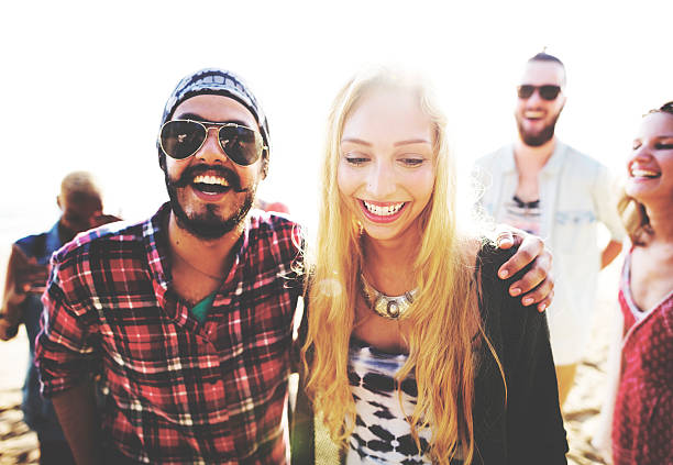 istock Friendship Bonding Relaxation Summer Beach Happiness Concept 590164342