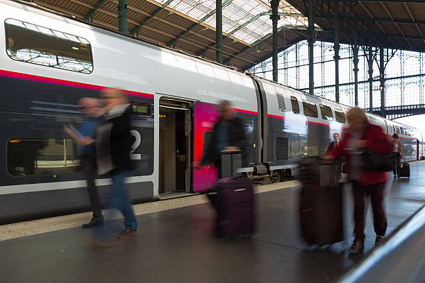 istock People coming to or leaving train station platform. 590165262