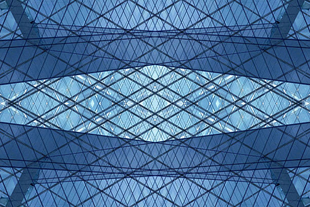 istock Double exposure photo of hi-tech building fragment with structural glazing 590167062