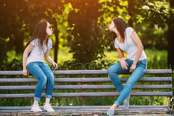 istock mother and daughter in the park 590168328