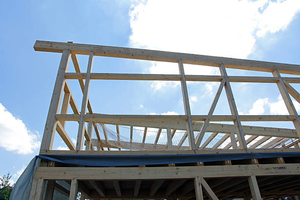 istock construction of a wooden house 590168658