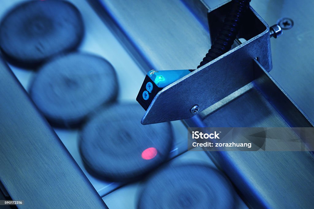 Spot Metering Sensor in the Production Line Close-up spot metering sensor in the production line. Sensor Stock Photo