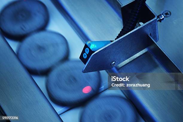 Spot Metering Sensor In The Production Line Stock Photo - Download Image Now - Sensor, Industry, Laser