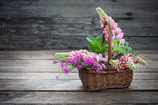 istock beautiful flowers in basket 590174212