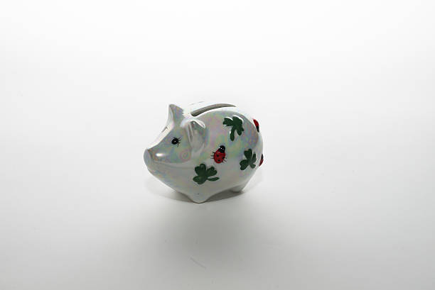 istock Piggy bank on white 590175248