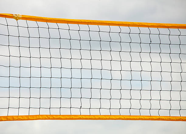 istock Volleyball summer sport. Net on a sandy beach 590175296